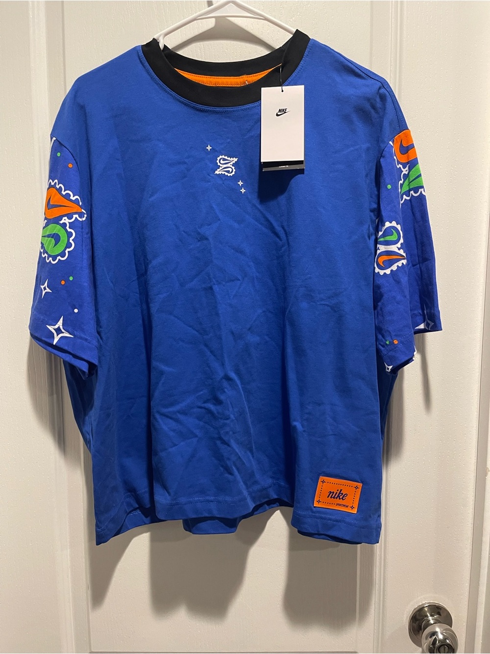 Nike Blue Graphic Short-Sleeve Tee with Orange & Green Accents